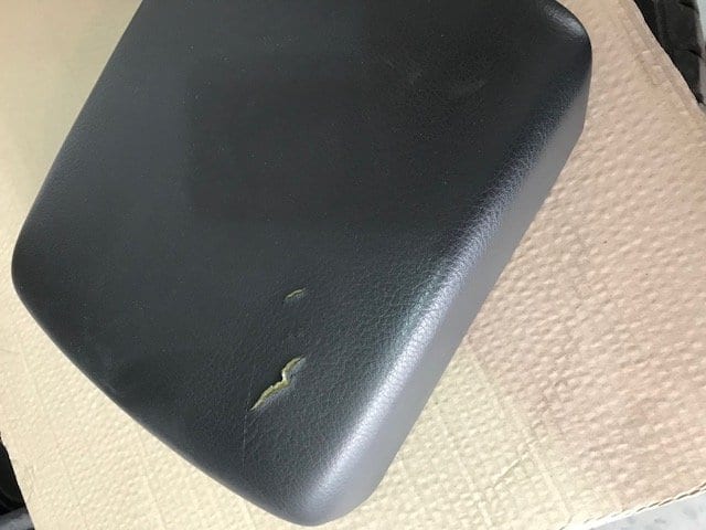 Damaged arm rest