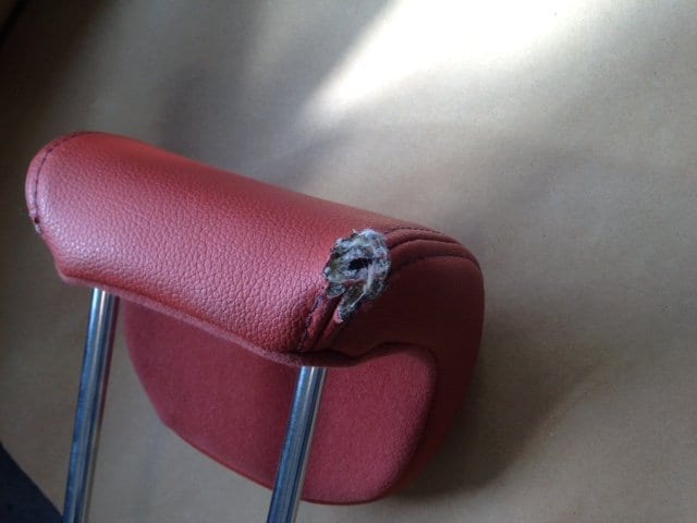 Damaged leather headrest